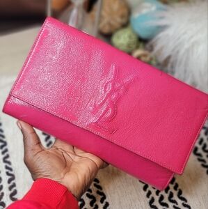 I'm selling my pre-owned authentic YSL clutch in a good condition